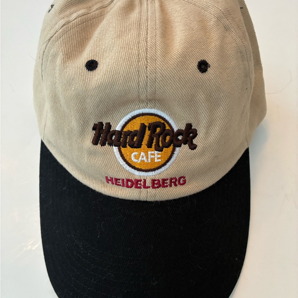 Hard Rock Cafe Heidelberg (Germany) 🇩🇪 Tan and Black cap. New/never worn, $36.
